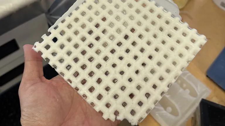 A cast Super Foam lattice part, fresh from the mold