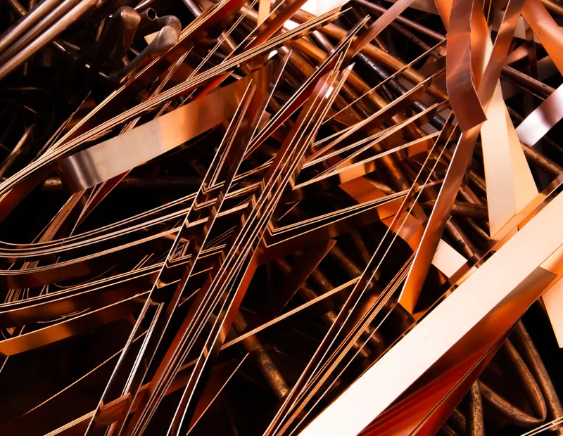 Bright copper pipes and stripped copper wire