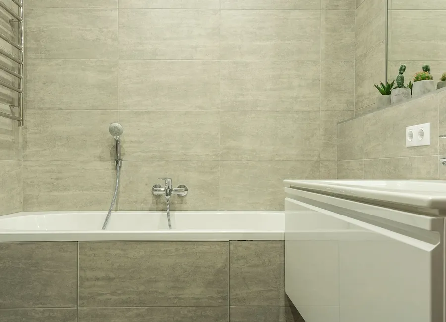 Freshly scrubbed bathroom tile and faucet