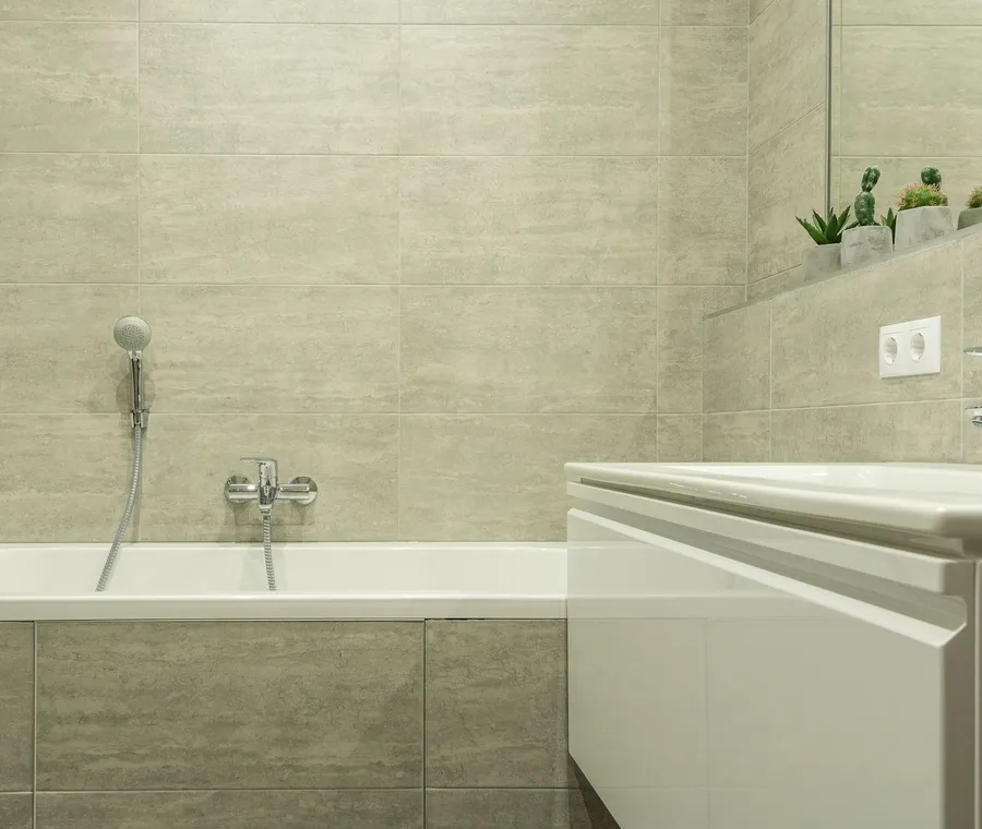 Freshly scrubbed bathroom tile and faucet