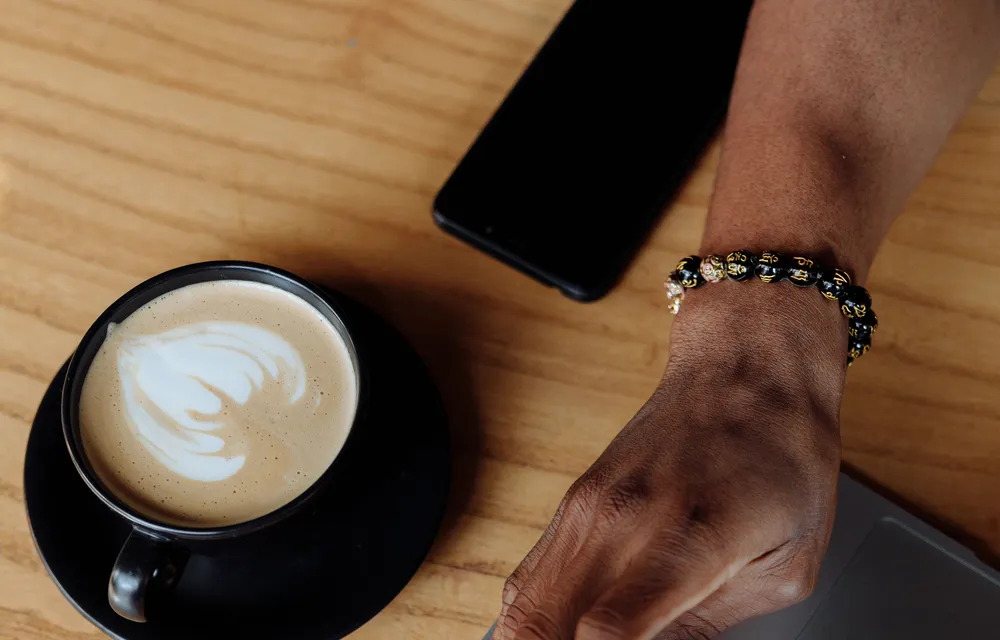 Updating&nbsp;a&nbsp;website&nbsp;from&nbsp;a&nbsp;laptop&nbsp;in&nbsp;a&nbsp;café