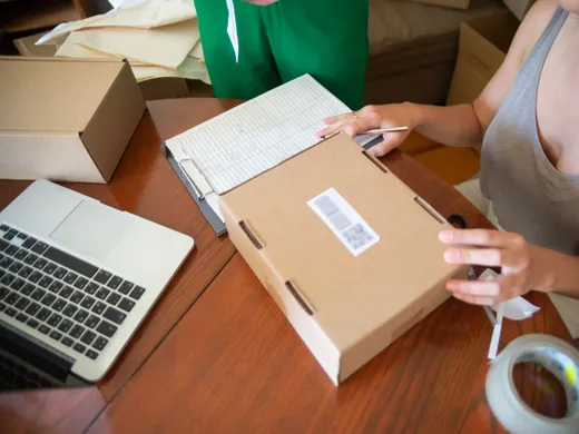 Small&nbsp;business&nbsp;owner&nbsp;packing&nbsp;customer&nbsp;orders