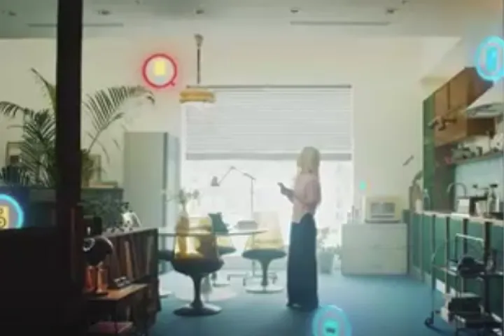 Still&nbsp;from&nbsp;a&nbsp;live&nbsp;action&nbsp;video&nbsp;in&nbsp;a&nbsp;bright&nbsp;office