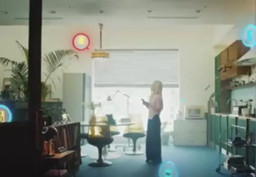 Still&nbsp;from&nbsp;a&nbsp;live&nbsp;action&nbsp;video&nbsp;in&nbsp;a&nbsp;bright&nbsp;office