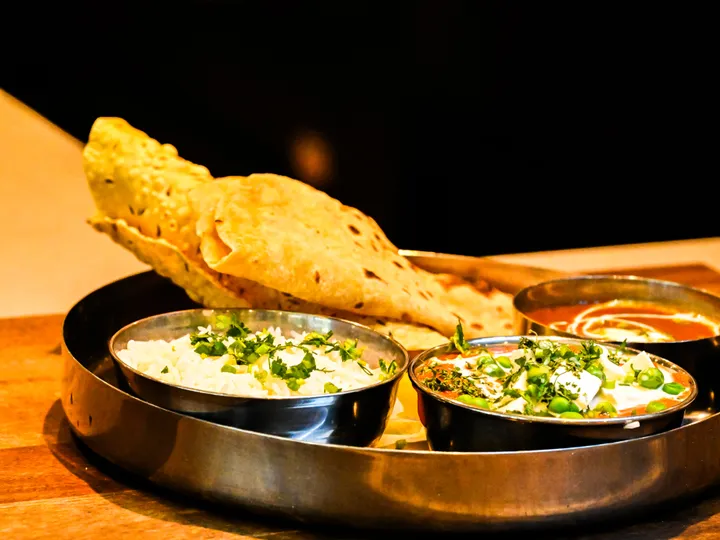 Colorful&nbsp;Indian&nbsp;thali&nbsp;with&nbsp;lentils&nbsp;and&nbsp;vegetables