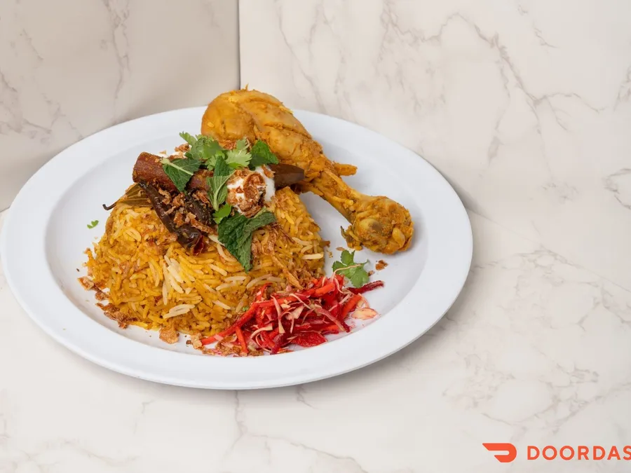 SciEats&nbsp;chicken&nbsp;biryani&nbsp;prepared&nbsp;with&nbsp;basmati&nbsp;rice,&nbsp;spices,&nbsp;fresh&nbsp;herbs,&nbsp;and&nbsp;chicken.