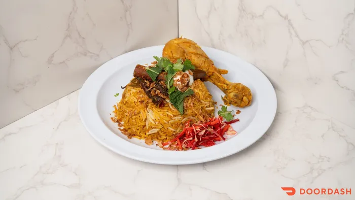SciEats&nbsp;chicken&nbsp;biryani&nbsp;prepared&nbsp;with&nbsp;basmati&nbsp;rice,&nbsp;spices,&nbsp;fresh&nbsp;herbs,&nbsp;and&nbsp;chicken.