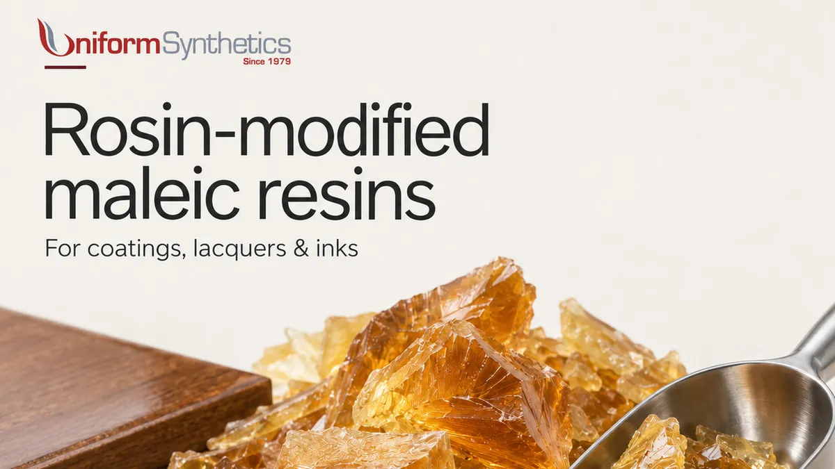 Amber rosin-modified maleic resin flakes beside a metal scoop