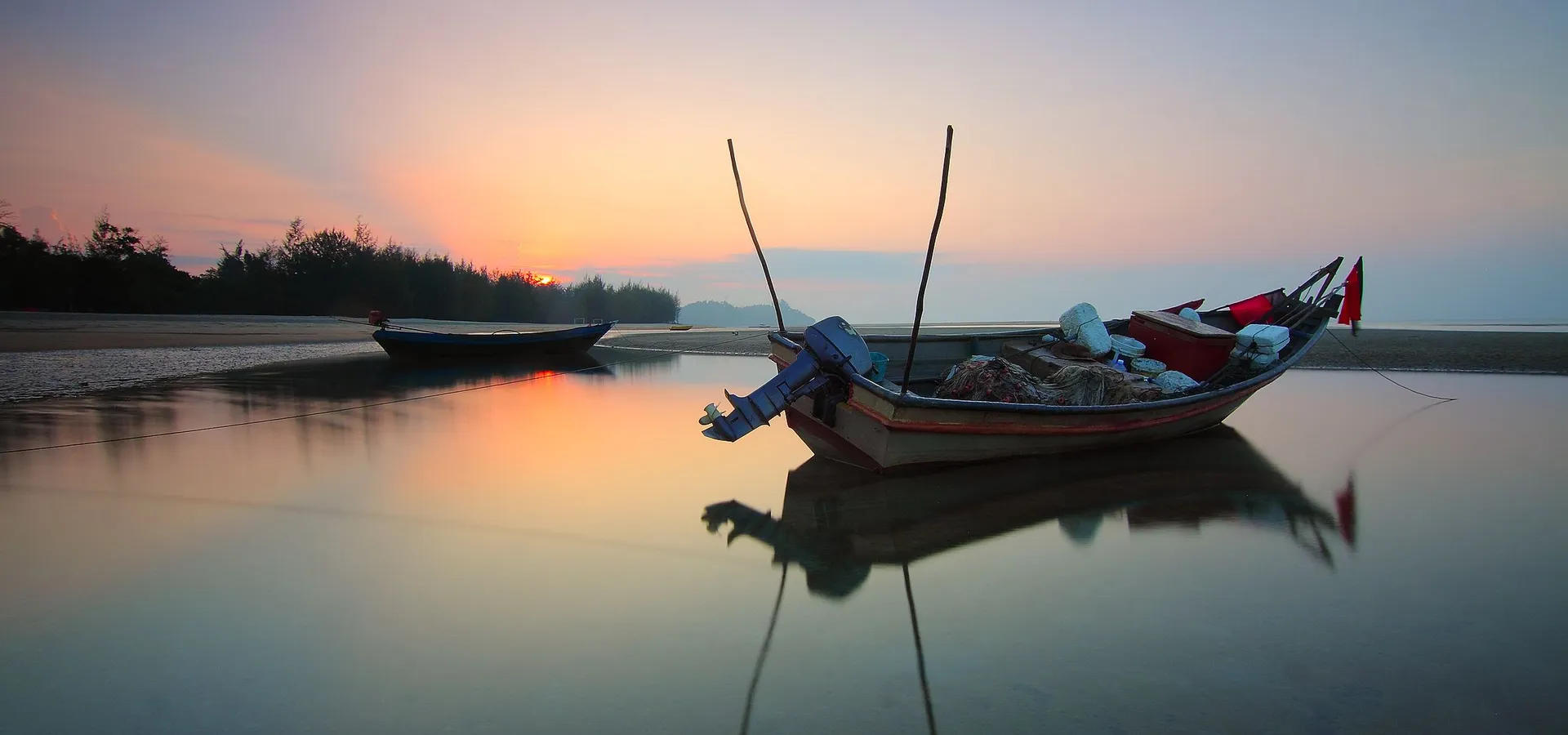 Fishing boats at sunrise